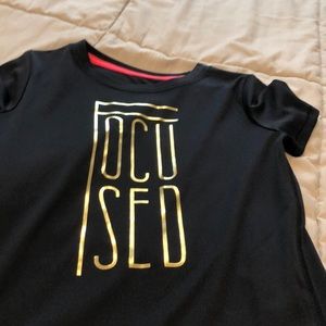 Gold and black shirt